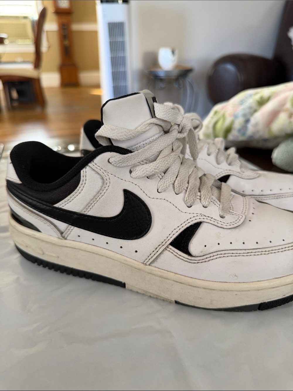 Nike Women’s White and Black Low-Top Swoosh Sneakers